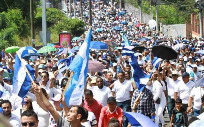 Honduras political debate reignited by church march and ruling party conflict
